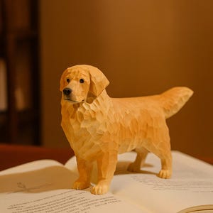 May include: A wooden sculpture of a Golden Retriever dog standing on an open book. The dog is carved from light-colored wood, with detailed features and a textured surface. The book has printed text.