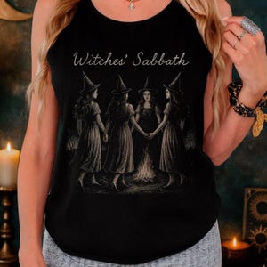 Witchy tank top inspired by the Witches’ Sabbath, perfect for pagans and Wiccans. A gothic, dark feminine design ideal as an occult or witchcraft gift, printed on a soft Comfort Colors top.