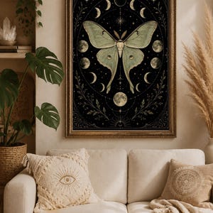 Luna Moth Moon Phases poster featuring a vintage celestial moth surrounded by lunar phases on a black background. Witchy wall art with botanical and mystical details, perfect for cottage witch decor, pagan altar spaces, gothic home decoration, moon lovers, Wiccan interiors, celestial aesthetic rooms, and nature-inspired spiritual gifts.