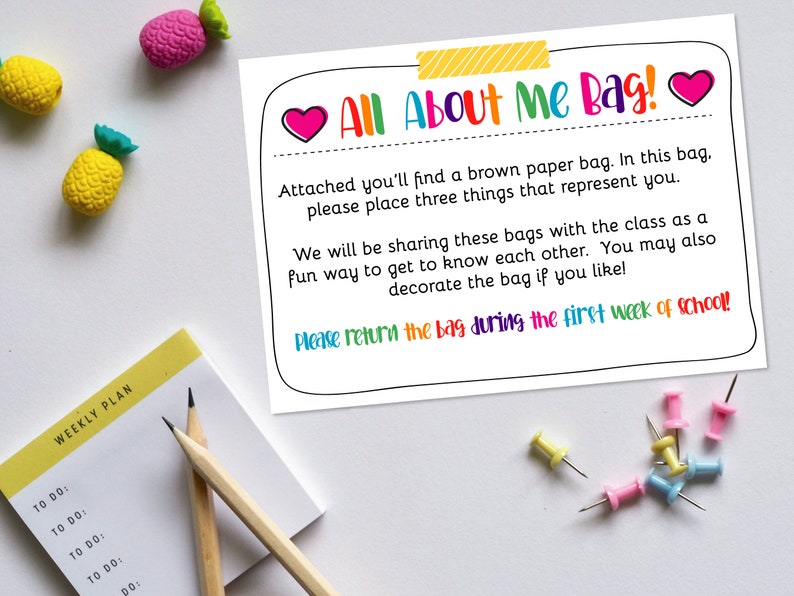 May include: A colourful printable card with the text "All About Me Bag!" and instructions to place three items in a brown paper bag to share with classmates. The card also includes the text "Please return the bag during the first week of school!"