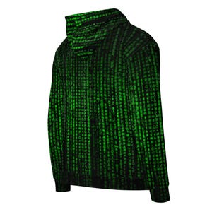 May include: Black hoodie with a green digital rain pattern. The hooded sweatshirt features a repeating pattern of green characters, creating a matrix-like design. The garment has a front pocket and a drawstring hood.