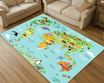 May include: A rectangular area rug featuring a world map design with continents in green, yellow, and orange, surrounded by a light blue ocean. The rug includes illustrations of animals and ocean creatures.