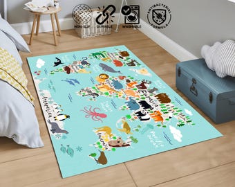 May include: A rectangular, light blue children's rug featuring a world map design with various animals and continents. The rug includes the text "Antarctica", "Australia", "Pacific Ocean", and "Eurasia". It also has icons indicating it is non-slip, durable, washable, and has an antibacterial formula.