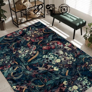 May include: A dark teal area rug with a floral and skull pattern. The rug features a detailed design with skulls, flowers, and snakes in shades of teal, red, yellow, and white. The rug is durable and washable.