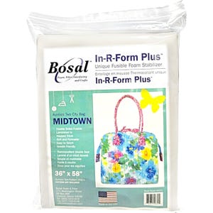 Puede incluir: Un paquete de Bosal In-R-Form Plus, un estabilizador de espuma fusible único. El paquete presenta un diseño de bolso floral colorido con el texto "Aunties Two City Bag MIDTOWN". El estabilizador mide 91 cm x 147 cm.