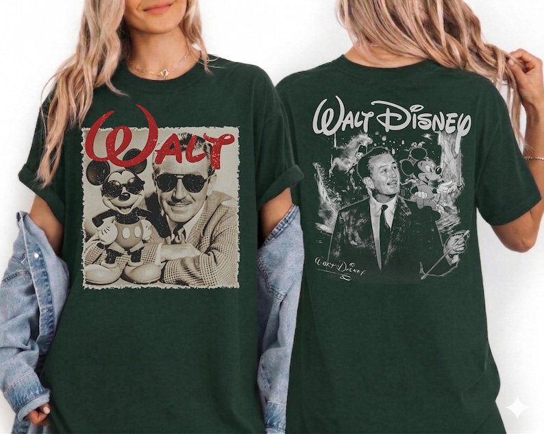 May include: A dark green t-shirt featuring a front graphic of Walt Disney and Mickey Mouse wearing sunglasses with the red text "WALT" above them. The back of the shirt displays a black and white portrait of Walt Disney with the text "Walt Disney".