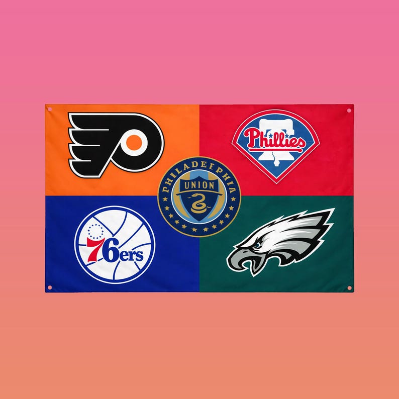 May include: A rectangular flag featuring four colored quadrants with Philadelphia sports team logos. The orange section displays the Flyers logo, red shows the Phillies, blue features the 76ers, and green contains the Eagles logo with a central Union crest.