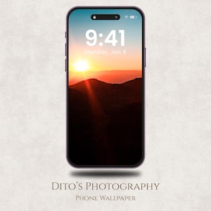 May include: A smartphone displays a vibrant sunset over mountains, with the time 9:41 and the date Monday, Jan 6 visible on the screen. The phone has a purple frame and the text "Dito's Photography Phone Wallpaper" is at the bottom.