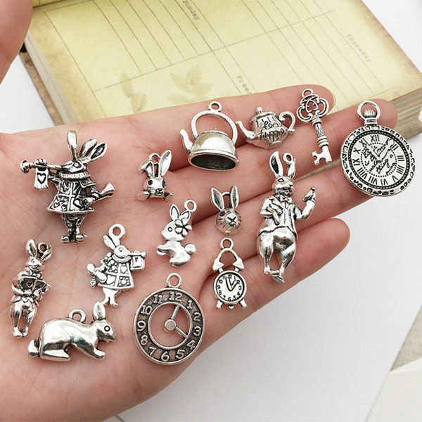 Vintage antique silver Alice in Wonderland accessories, rabbits, clocks, teapots, keys, bracelets, necklace accessories