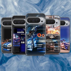 May include: A collection of five phone cases featuring images of sports cars. The cases showcase various car designs, including a blue Nissan Skyline, with vibrant colors and detailed graphics. The cases are displayed against a blue and white background.