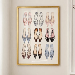 May include: A framed wall art print featuring a grid of nine pairs of illustrated high-heeled shoes in various colors, textures, and styles, including pink, silver, leopard print, black, and blue designs, all displayed within a gold-toned frame.