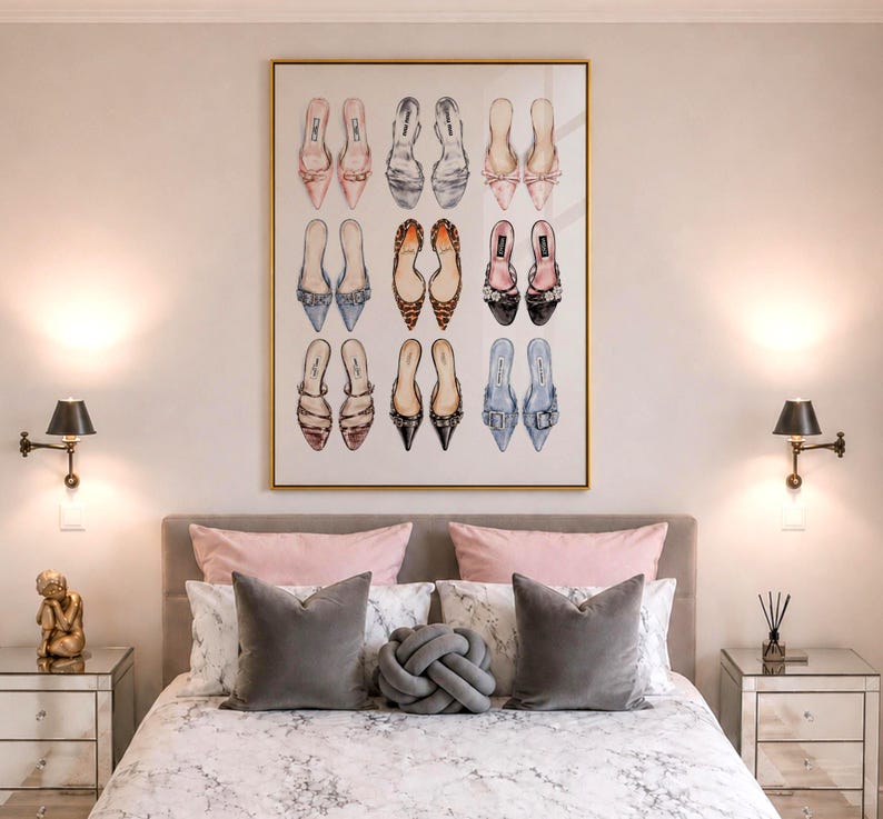 May include: A rectangular framed wall art print featuring a grid of nine pairs of illustrated women's shoes in various colors and styles, including pink, blue, leopard print, and black, displayed on a white background with a thin gold frame.