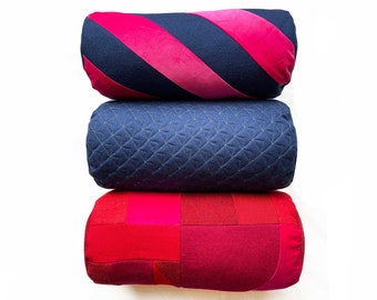 mix and match red, pink and navy bolsters, stripe, quilted & patchwork