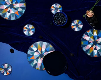 Round 'Harlequin' patterned geometric table mats