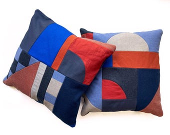Patchwork geometric patterned 'collage' cushion - red/blue/navy
