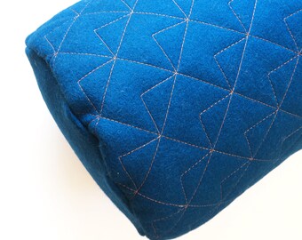 Geometric quilted bolster cushion - Blue & copper