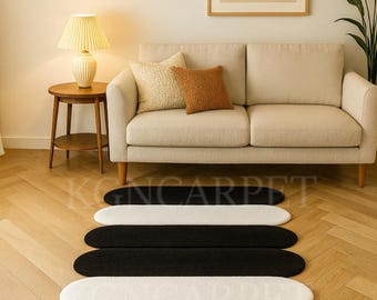Modern Abstract Geometric Rug - Black & White Pill-Shaped Organic Silhouette, Minimalist Hand-Tufted Statement Carpet for Living Room Decor.