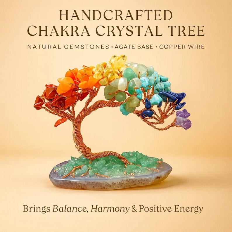 May include: A handcrafted Chakra Crystal Tree made with natural gemstones, an agate base, and copper wire. The tree features colorful gemstones representing the chakras, with text that reads "Brings Balance, Harmony & Positive Energy."