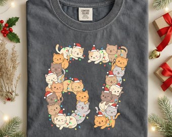 Funny 6 7 Meme Shirt, Christmas Cat 67 T-Shirt, Cute Cat Lover Xmas Gift, Funny Santa Kitty Six Seven Graphic Tee