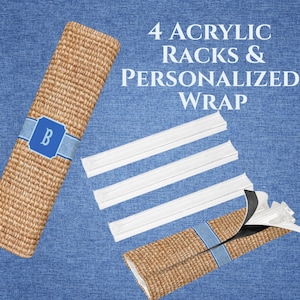 May include: A woven wrap with a blue denim band and a blue emblem with the letter "B". The image also shows four white acrylic racks. Text on the image reads "4 Acrylic Racks & Personalized Wrap". The background is a blue denim texture.