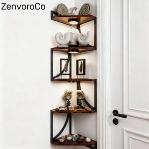 May include: A corner shelf unit with a dark metal frame and wooden shelves. The shelves display decorative items, including white seashell sculptures, framed art, and polished stones. The unit is illuminated by small lights.