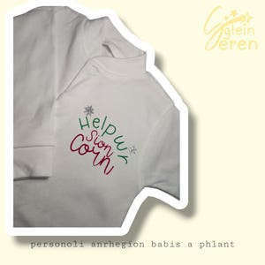 Spersonalizowany walijski bożonarodzeniowy śpioszek – bawełniany kombinezon nocny „Helpwr Siôn Corn”.