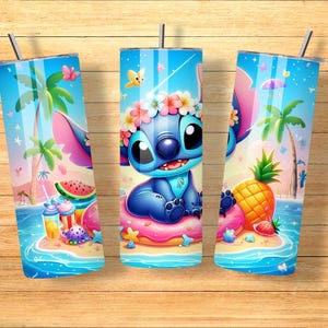 May include: Three blue tumblers with a tropical design featuring Stitch, palm trees, and beach elements. The tumblers have a stainless steel straw and a colorful illustration of Stitch on a beach with a pineapple, watermelon, and drinks.