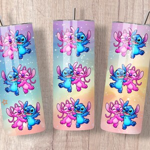 May include: Three stainless steel tumblers with a colorful design featuring the characters Stitch and Angel. The tumblers have a gradient background of pink, purple, and blue. Each tumbler has a silver straw and lid.