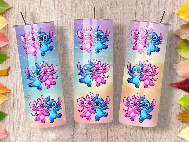 May include: Three stainless steel tumblers with a colorful design featuring the characters Stitch and Angel. The tumblers have a gradient background of pink, purple, and blue. Each tumbler has a silver straw and lid.
