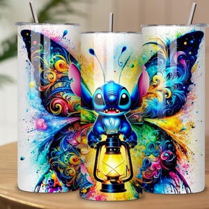 May include: Three white stainless steel tumblers with a colorful butterfly and Stitch design. The design features a blue cartoon character holding a lantern, set against a vibrant background of blues, yellows, and pinks. Each tumbler has a silver straw.