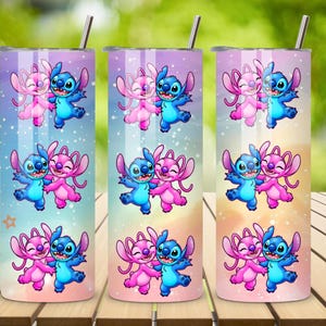 May include: Three stainless steel tumblers with a cartoon design of a blue and pink alien couple. The tumblers have a gradient background of pink, blue, and yellow. Each tumbler has a silver straw.