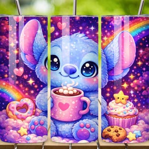 May include: A set of three stainless steel tumblers featuring a cartoon character holding a mug of hot chocolate. The design includes a rainbow, hearts, stars, a donut, a cupcake, and a cookie, all in a vibrant, colorful style.