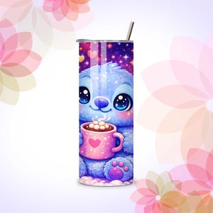 May include: A tall, stainless steel tumbler featuring a cartoon character holding a pink mug with a heart. The character is blue with large eyes, and the background is a starry night sky. A silver straw is inserted into the lid.
