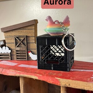 Indiana - Llaveros inspirados en la gallina en el nido Aurora