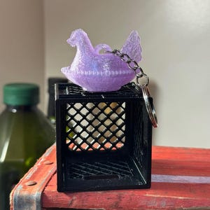 Indiana - Llaveros inspirados en la gallina en el nido Lavender Mist