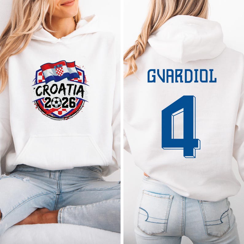 A white hoodie with a graphic design and text, and a number on the back.