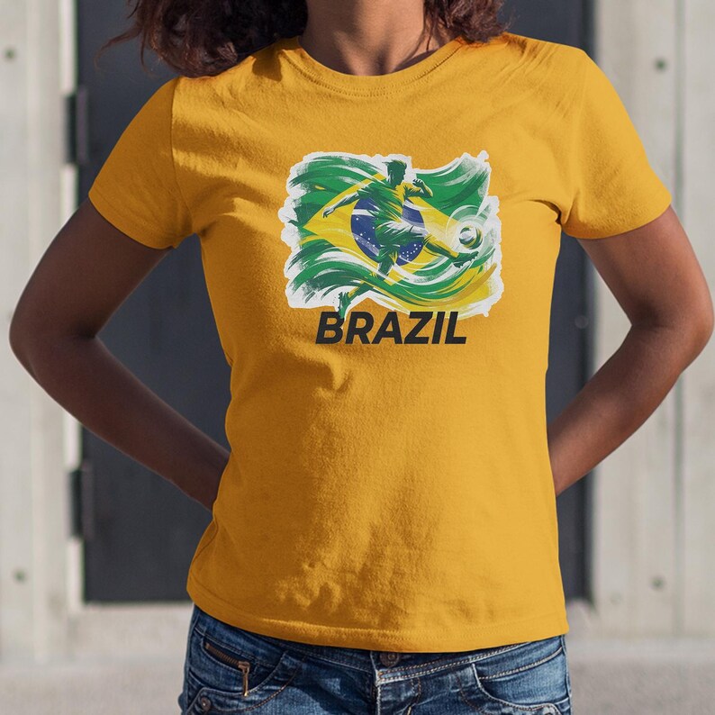A yellow t-shirt with a graphic of a soccer player and the word "BRAZIL" printed on it.