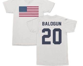 Balogun #20 USA Flag Inspired Jersey Style Graphic Tee, 2-Sided Star Player Tribute For Fans, Soccer World Tournament Gift Unisex T-Shirt