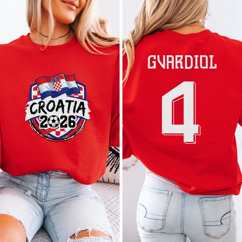 A red shirt with a graphic and text, and a number on the back.