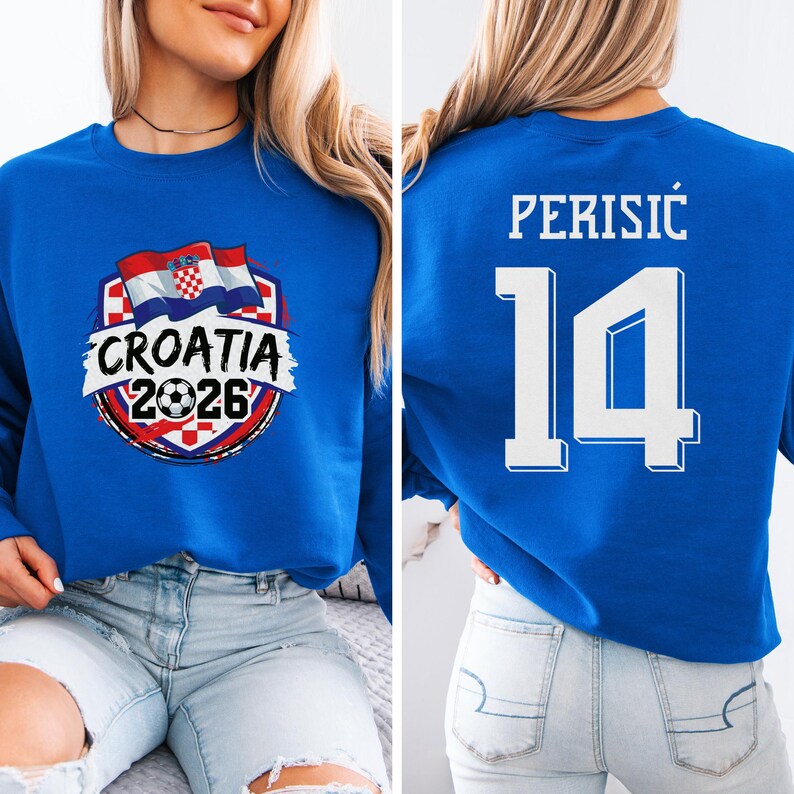 A woman wearing a blue sweater with a design featuring the Croatia national flag and the text "Cromia 2016" printed on it.