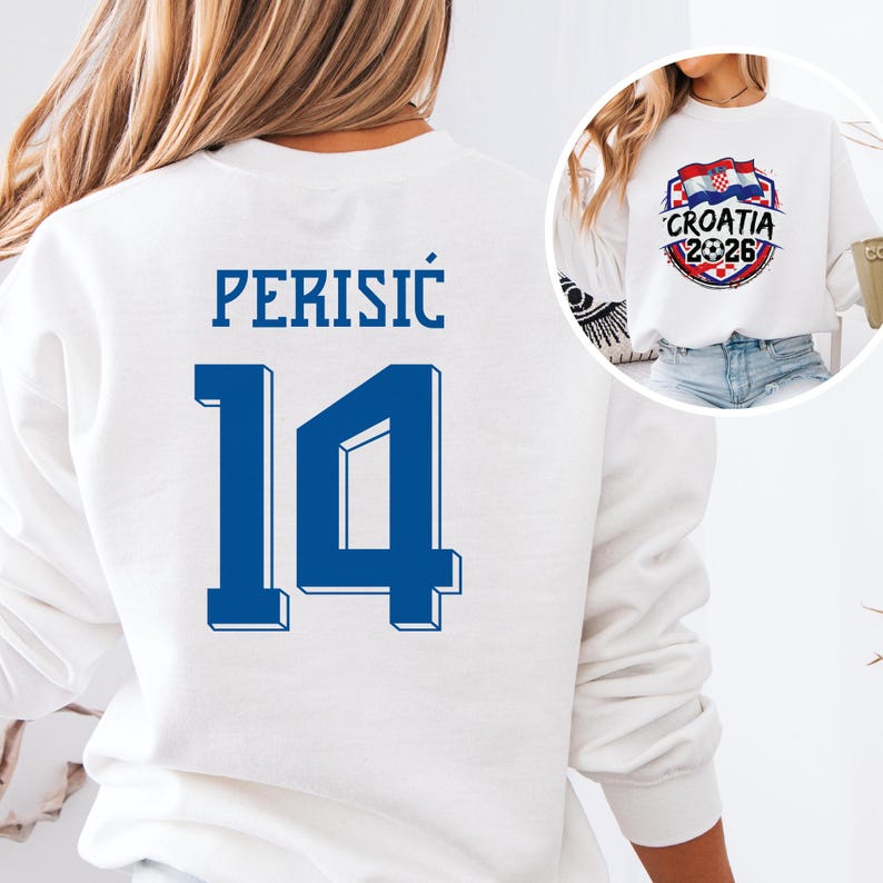 A white sweatshirt with the number 14 printed on it, along with the text "PERISIC 14" and "CROATIA 2026" printed on it.