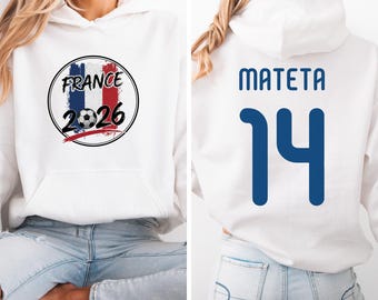 Camiseta gráfica Mateta #14, jugador estrella de Francia, estilo camiseta de fútbol de dos caras, regalo personalizado, camiseta unisex inspirada en los fanáticos del fútbol del torneo mundial.