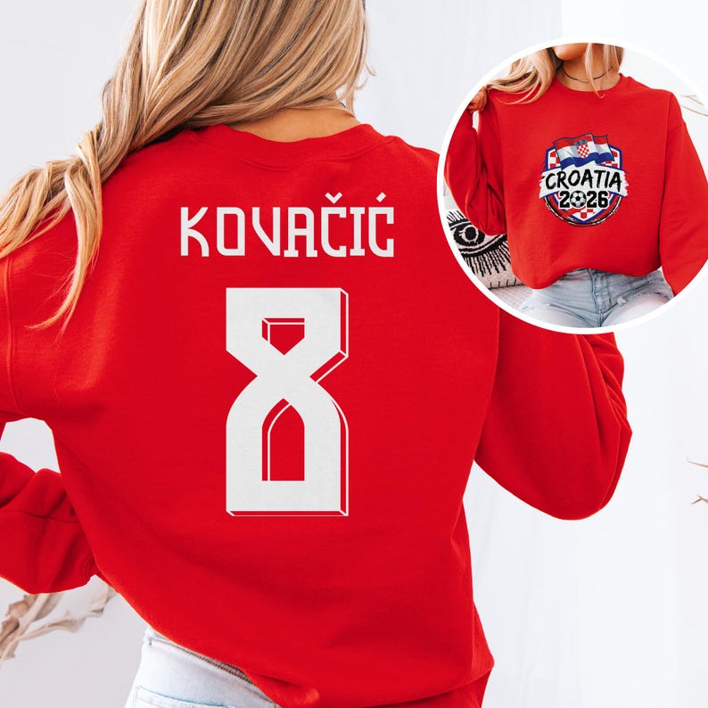 A red sweater with the name 'KOVACIC' and the number '8' printed on it, along with a logo for Croatia.