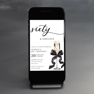 May include: A mobile phone screen shows a white invitation with black text and a champagne glass illustration. The invitation reads "Sixty & Fabulous" and announces a 60th birthday celebration on January 20th at 2:00 PM.
