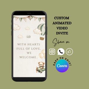 May include: A smartphone displays a custom animated video invite with a baby theme. The design includes a hot air balloon, teddy bear in a plane, clouds, and the text "With hearts full of love, we welcome." The invite is easy to edit.