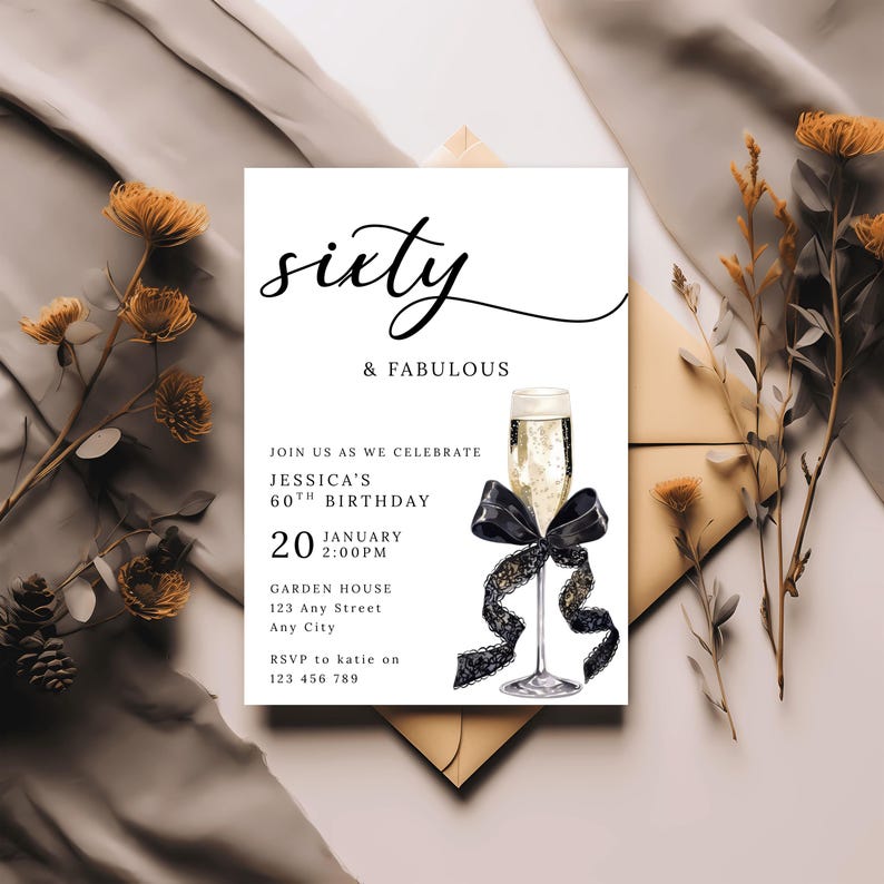 May include: A white invitation card with the words "sixty & fabulous" in black script. The invitation includes details for Jessica's 60th birthday, a champagne glass, and a black bow. The card is surrounded by dried flowers.