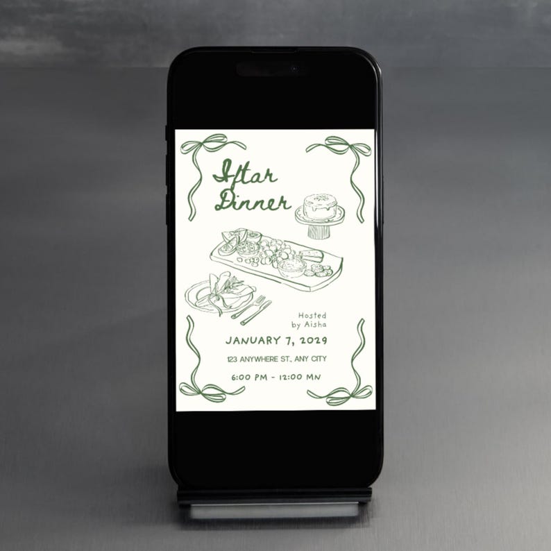 May include: A black smartphone displays a green and white invitation for an Iftar Dinner. The invitation includes illustrations of food, the date January 7, 2029, and the time 6:00 PM - 12:00 MN. The invitation is hosted by Aisha.