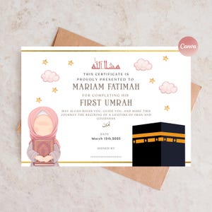 May include: A certificate with gold trim, featuring the name "Mariam Fatimah" and the text "First Umrah." The design includes illustrations of stars, clouds, and a Kaaba. The date is March 13th, 2025.