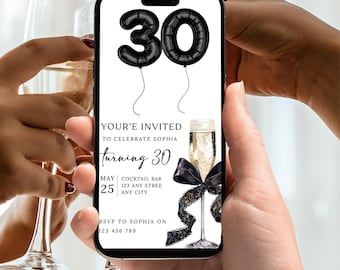 May include: A smartphone screen shows a birthday invitation with black balloon-shaped numbers reading "30." The invitation text reads "Your'e Invited to Celebrate Sophia turning 30" with event details and RSVP information. Two champagne flutes are in the foreground.