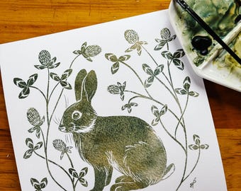 nature botanical watercolor painting spring art print of rabbit in clover